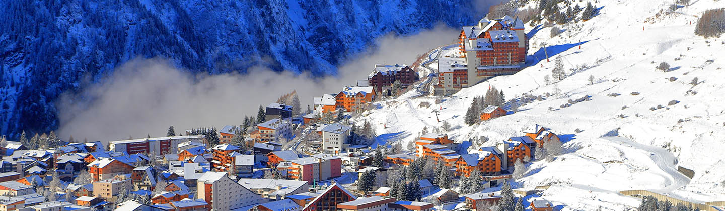 Les Deux Alpes surrounded by snowy mountains, France