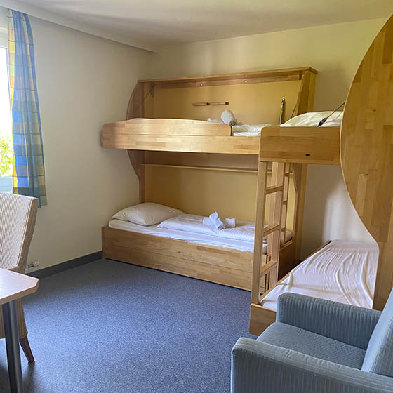 Multi-bedded room at the Bachlehen and Johanneshof hotel in Salzburger Sportwelt