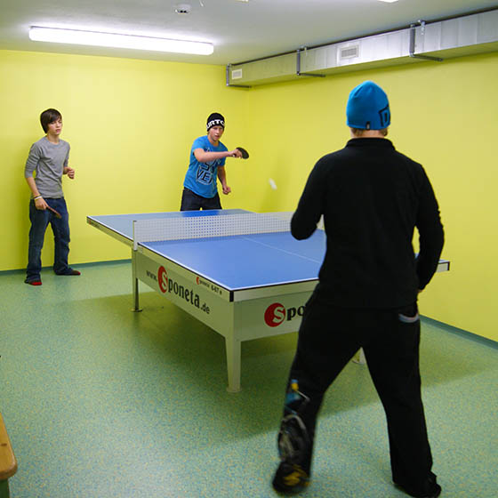 Students playing ping pong at the Felseralm in Obertauern